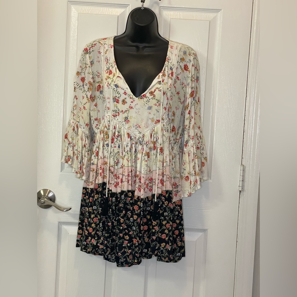 Love Kyla brand dress with floral prints with a 3/4 length flounce sleeve, Small